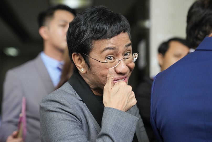 Filipino journalist Maria Ressa, 2021 Nobel Peace Prize winner and Rappler CEO, talks to reporters after being acquitted by the Pasig Regional Trial Court, September 2023