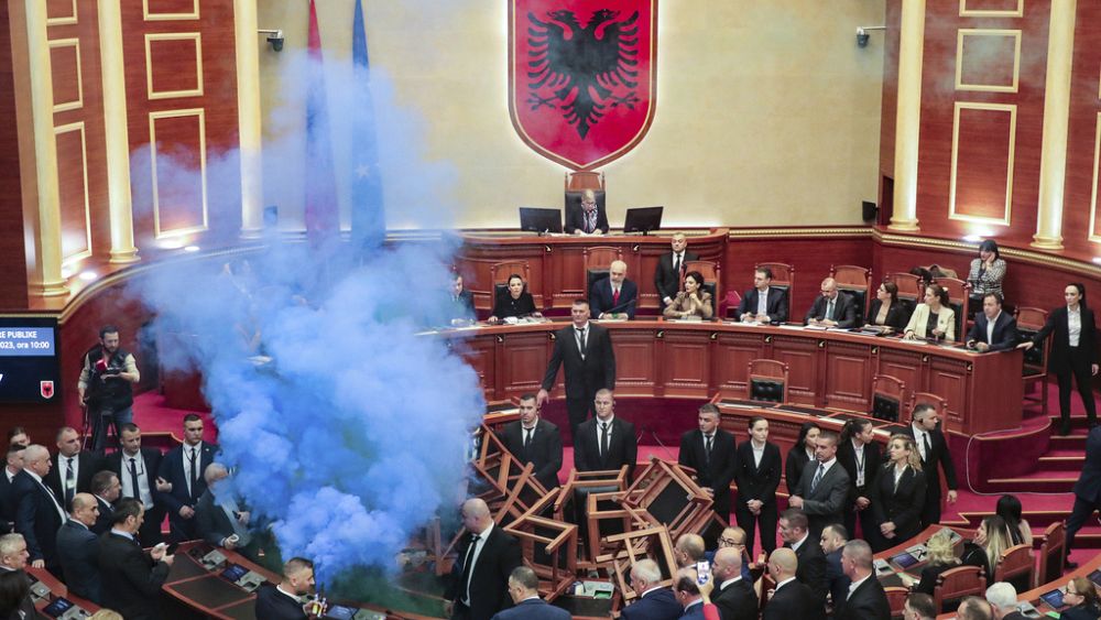 Flares, fires and barricades: Why Albania's opposition party likes to protest in parliament thumbnail