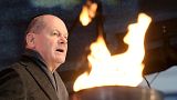 German Chancellor Olaf Scholz attends the ceremony to light the first candle of Hanukkah menorah at Brandenburg Gate in Berlin, Germany, Thursday, Dec. 7, 2023