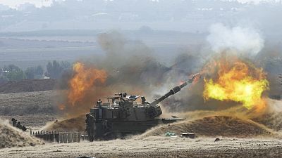 An Israeli mobile artillery unit fired a shell from southern Israel towards the Gaza Strip, in a position a near the Israel Gaza border, Israel, Wednesday, Oct. 11, 2023. 