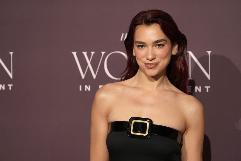 Dua Lipa arrives at The Hollywood Reporter's Women in Entertainment Gala on Thursday, Dec. 7, 2023.