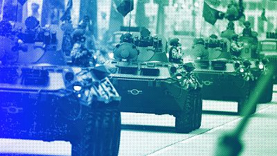 Army armored vehicles participate in a parade marking Independence Day in Caracas, July 2022