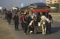  Palestinians flee the Israeli ground offensive in Khan Younis, Gaza Strip, Wednesday, Dec. 6, 2023. 