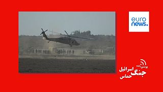 Israeli military helicopter lands near the Gaza Strip