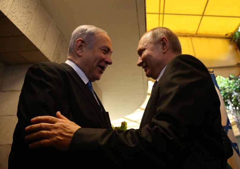 Strained relationship: Russian President Vladimir Putin (R) greets Israeli Prime Minister Benjamin Netanyahu (L) during their meeting at Prime Minister's Office in 2020