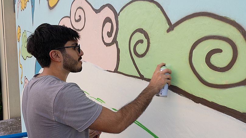 Abdulla depicts his culture in vivid, contemporary murals that everyone can identify with