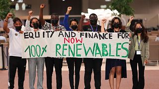 Activists from CAN International call for 'Equity and Finance for 100% Renewables', 11 December 2023, Dubai