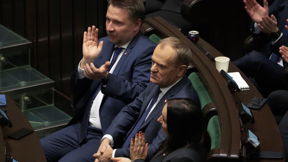 Poland’s parliament elects centrist party leader Donald Tusk as prime minister