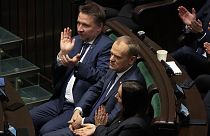 The leader of Poland's opposition Donald Tusk, center, after Poland's government losing a confidence vote at the parliament in Warsaw, Poland, Dec 11, 2023