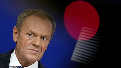 Leader of the Polish Civic Coalition Donald Tusk addresses a media conference prior to a meeting with European Commission President Ursula von der Leyen.