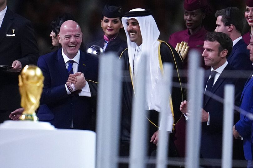 HH Sheikh Tamim bin Hamad Al Thani, emir of Qatar, shaking hands with FIFA President Gianni Infantino at the World Cup 2022 Final