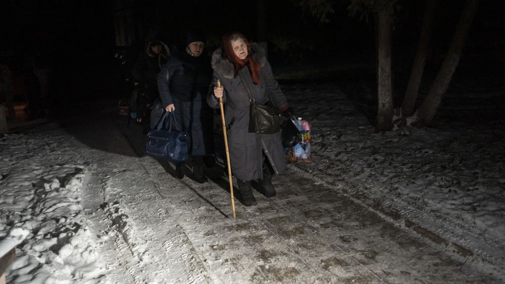 People flee Russian-controlled areas of Ukraine through dangerous corridors on the frontline thumbnail