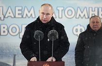 Picture distributed by Russian state agency Sputnik shows Vladimir Putin  attending a flag-rising ceremony at Sevmash shipyard on December 11, 2023.