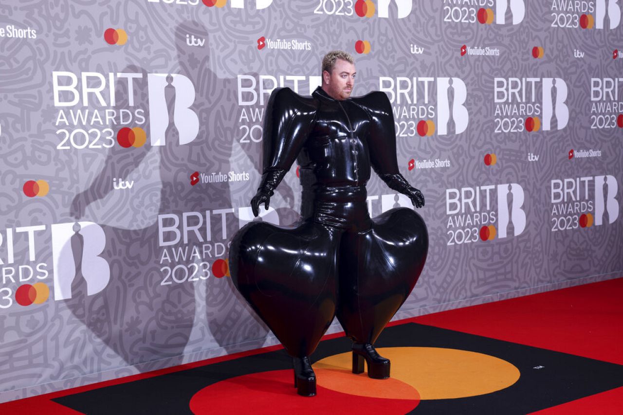 Sam Smith poses for photographers upon arrival at the Brit Awards 2023 in London, Saturday, Feb. 11, 2023.