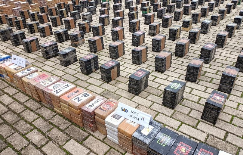 This image taken on December 12, 2023 shows a total of 11 tonnes of cocaine in plastic-wrapped packs from two seizures made by police in Valencia and Vigo.
