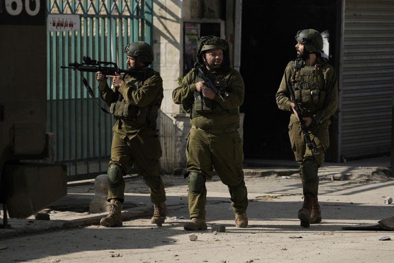 Israeli soldiers are seen during an army operation, in the Jenin refugee camp in the West Bank.