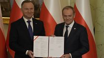 Президент Польши Анджей Дуда и новоизбранный премьер Дональд Туск