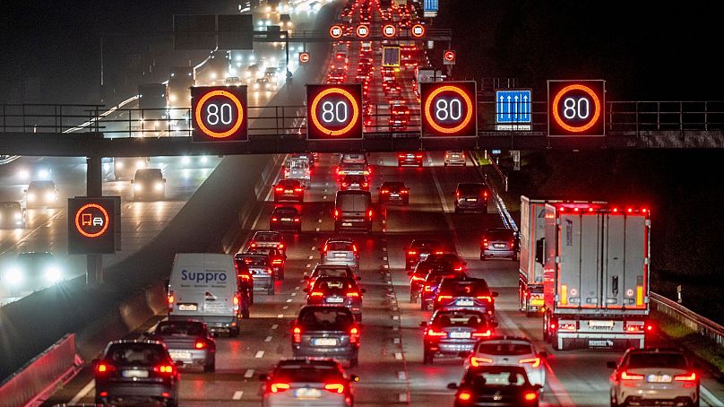 Cars and trucks drive on a highway in Frankfurt, Germany, 3 November 2022.
