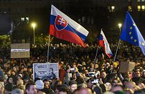 People take part in a protest against scrapping the Special Prosecutor's Office organised by the Slovakian opposition parties in front of the Government Office in Bratislava