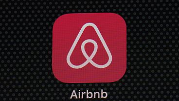 The Airbnb app icon is displayed on an iPad screen in Washington, D.C., on May 8, 2021.