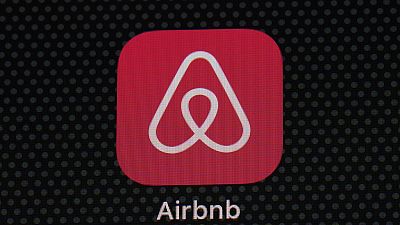 The Airbnb app icon is displayed on an iPad screen in Washington, D.C., on May 8, 2021.