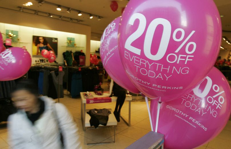 FILE: Shoppers at a branch of women's wear retailer Dorothy Perkins in central London Thursday, Nov. 20, 2008