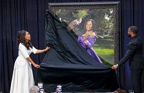 Oprah Winfrey and artist Shawn Michael Warren, unveil Warren's portrait of Winfrey, Wednesday, Dec. 13, 2023, during a ceremony at the Smithsonian's National Portrait Gallery.