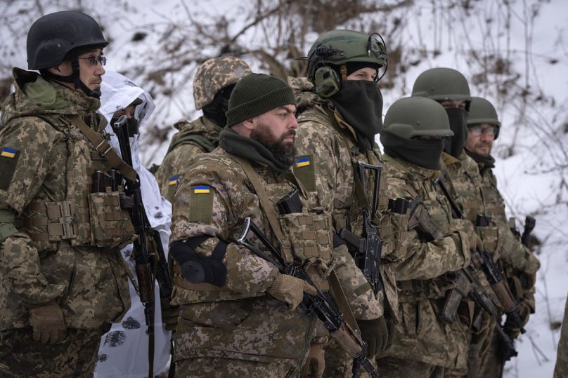 Members of the pro-Ukrainian Russian ethnic Siberian Battalion at a training exercise near Kyiv.