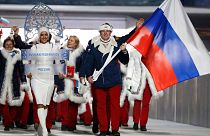 FILE: FILE - Bobsledder Alexander Zubkov carries the Russian flag during the opening ceremony of the 2014 Winter Olympics in Sochi, Russia, on Feb. 7, 2014.