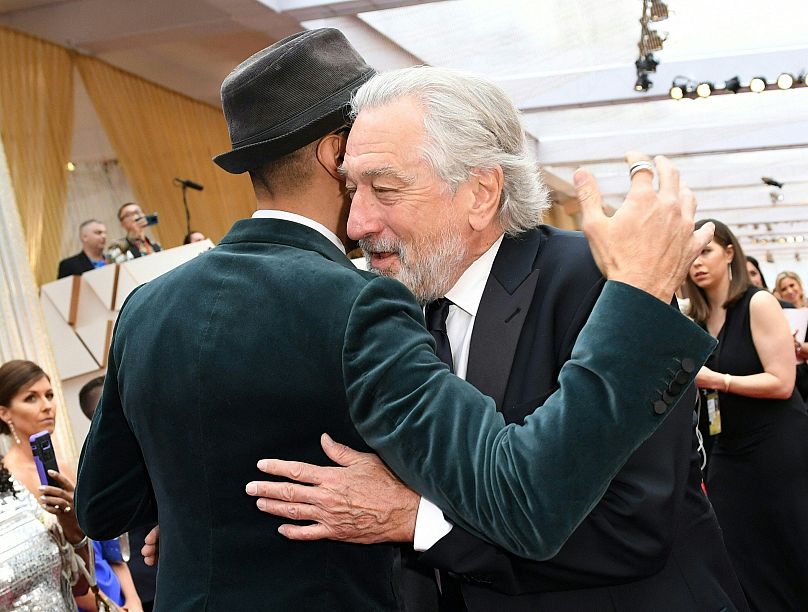 French artist JR (left) says he and Robert De Niro have been friends for over 15 years.