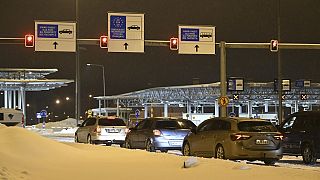 Cars in line wait for the closed Vaalimaa border check point between Finland and Russia to re-open in Virolahti, Finland, Wednesday, Dec. 13, 2023. 