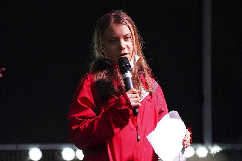 Swedish climate activist Greta Thunberg speaks on the stage of a demonstration in Glasgow, Scotland during COP26 in 2021.