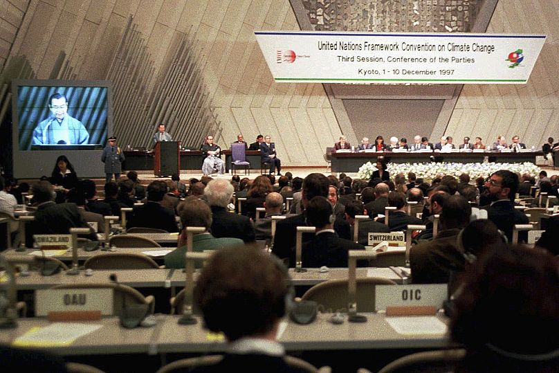 Kyoto Gov. Teiichi Aramaki makes a speech during the opening session of the U.N. Framework Convention on Climate Change in 1997.