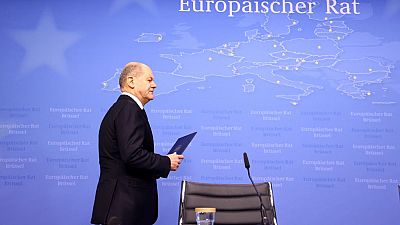 Germany's Chancellor Olaf Scholz arrives to give a press conference at the European Council at the European headquarters in Brussels, on 15 December 2023 