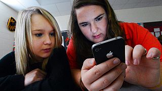Students use their phone in class, 13 March 2014