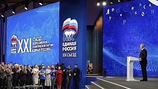 بوتين خلال المشاركة في مؤتمر حزب روسيا الموحدة
