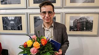 Russian American writer Masha Gessen poses for a photo after receiving the Hannah Arendt Prize. 