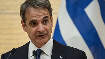 Greek Prime Minister Kyriakos Mitsotakis speaks during a joint press conference with Japanese Prime Minister Fumio Kishida in Tokyo, Monday, Jan. 30, 2023.