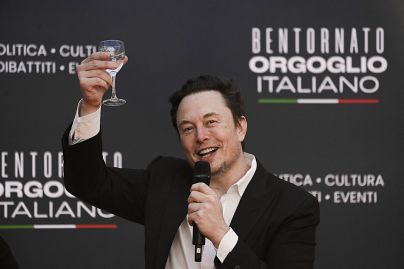SpaceX's CEO Elon Musk cheers as he speaks at the annual political festival Atreju, organised by the Giorgia Meloni's Brothers of Italy party, Saturday, Dec. 16, 2023.