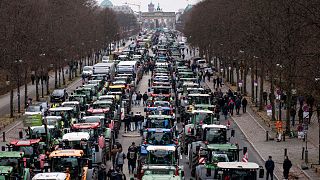Farmers with tractors take part in a protest rally organized by the German Farmers' Association in Berlin, Germany, Monday, Dec. 18, 2023. 