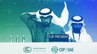 COP28 President Sultan al-Jaber adjusts his ghutra at a stocktaking plenary session at the COP28 UN Climate Summit in Dubai, December 2023