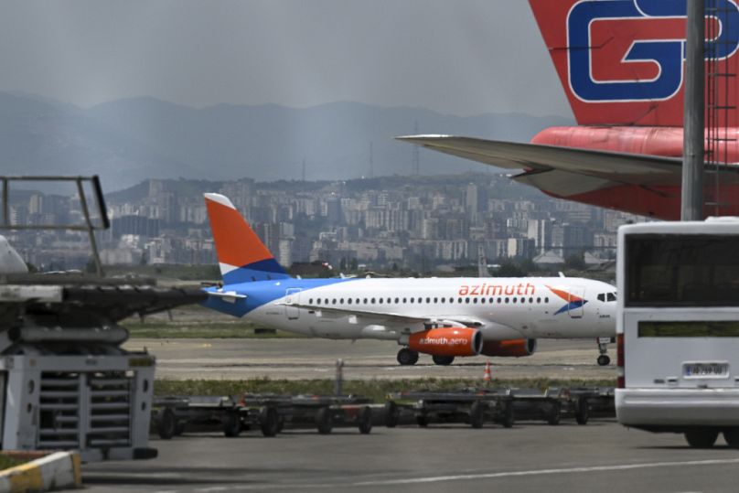 A Russian airplane of Azimuth air company taxies after landing at the International Airport outside Tbilisi, May 2023
