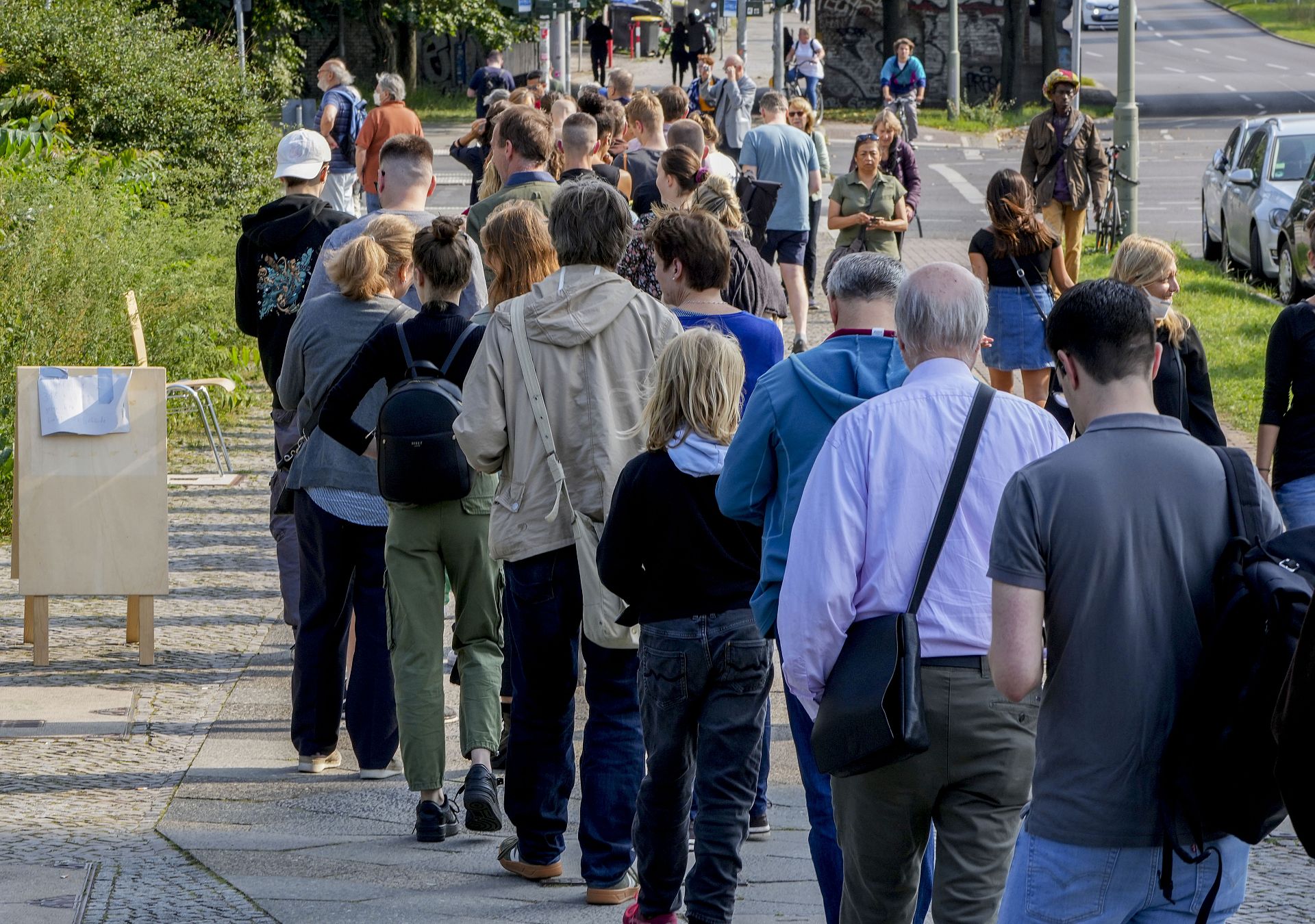 Voters waiting in line at a polling station in Berlin, Germany.
