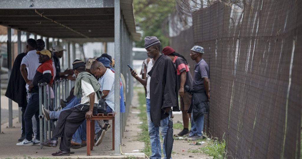 South Africa: Families anxiously wait outside underground mine protest