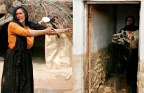 Palestinian women react after raw sewage erupted from holding pools and swept through a village in the northern Gaza Strip, March 27, 2007.