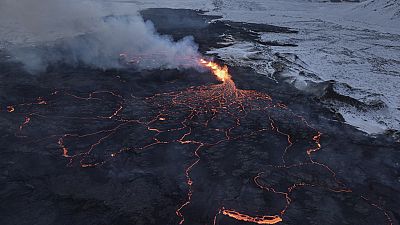 A view of the Southern active segment of the original fissure of an active volcano in Grindavik on Iceland's Reykjanes Peninsula, Tuesday, Dec. 19, 2023.