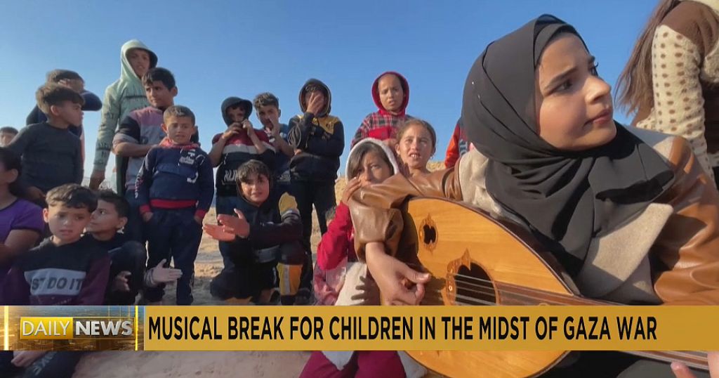 Gaza: Woman plays oud for displaced children to block out sound of war - Vimarsana News