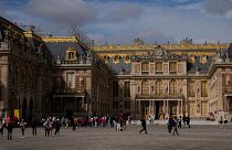 Visitors queue in the courtyard of the Chateau de Versailles, outside Paris, France, 19 September, 2023.