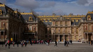 Visitors queue in the courtyard of the Chateau de Versailles, outside Paris, France, 19 September, 2023.