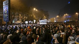 People take part in a protest against scrapping the special prosecutor's office in Bratislava, Tuesday 19 December